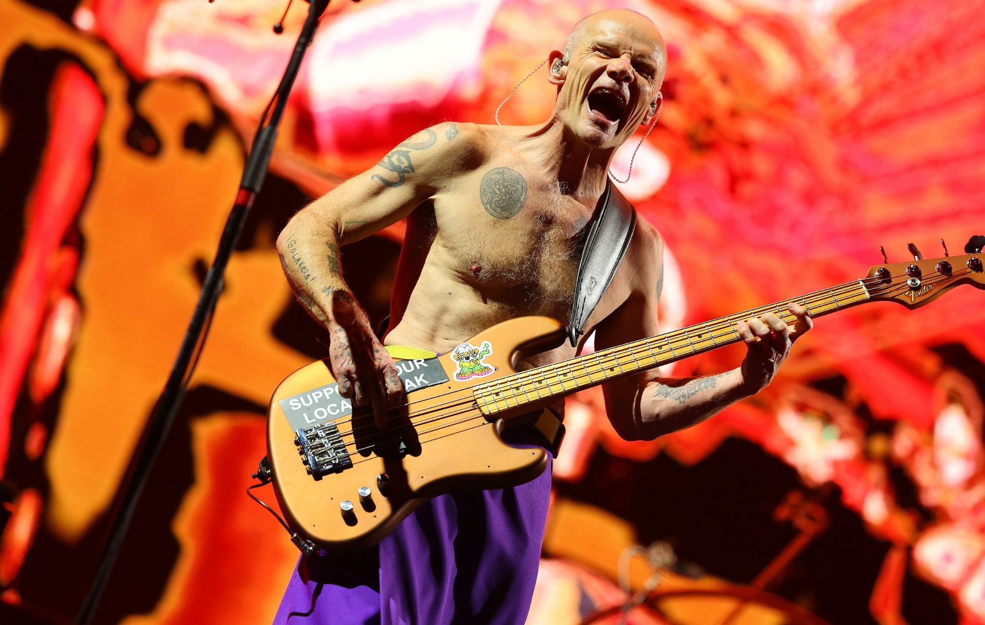 Bassist Flea of the Red Hot Chili Peppers performs at U.S. Bank Stadium on April 08, 2023