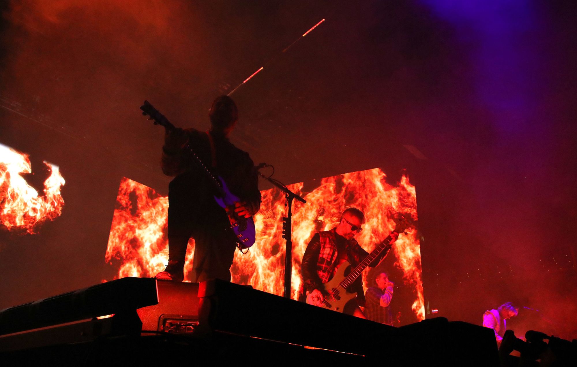 Zacky Vengeance, Johnny Christ, M. Shadows, and Synyster Gates of Avenged Sevenfold perform in 2024