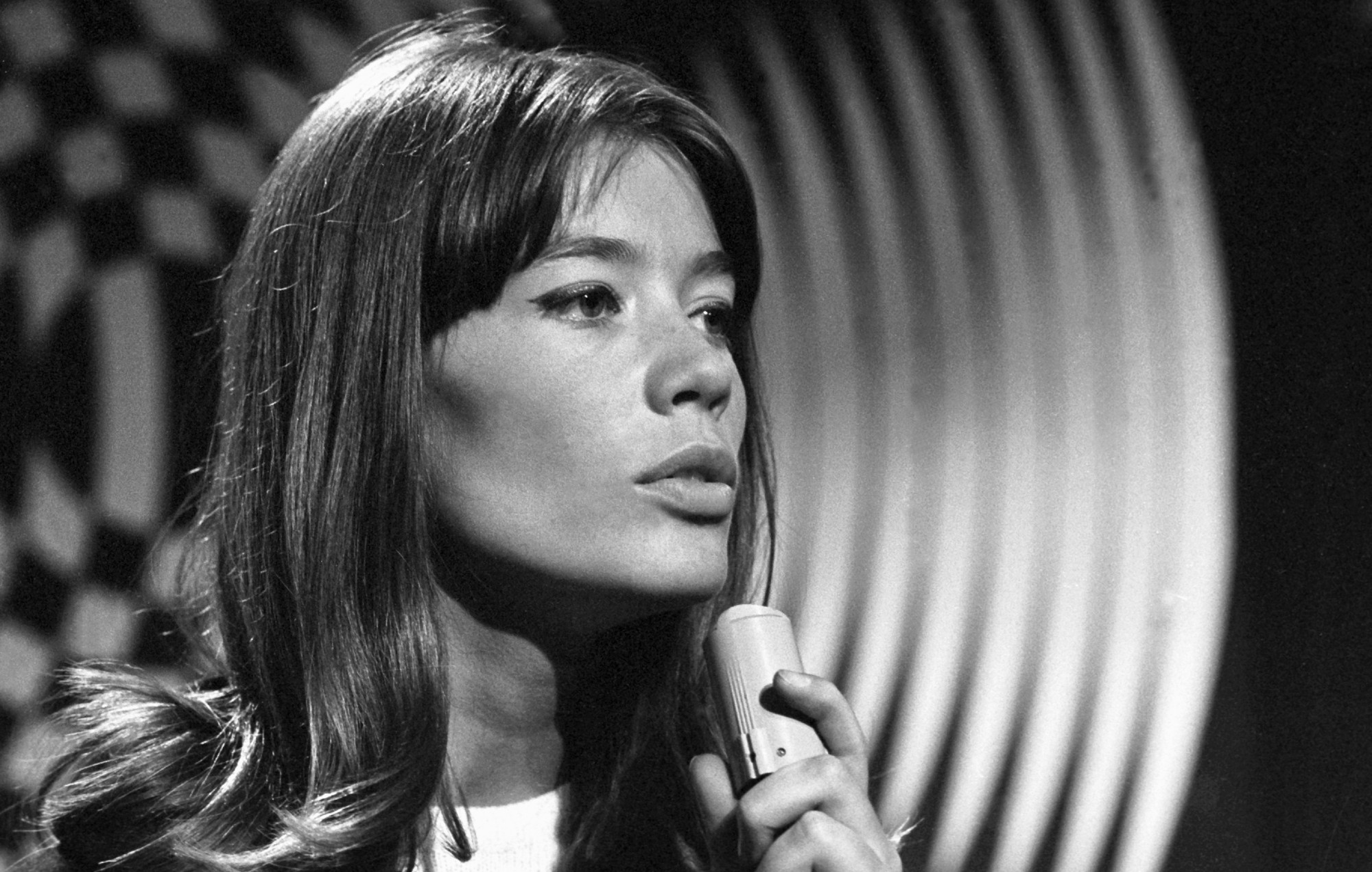 Francoise Hardy recording a song for the television