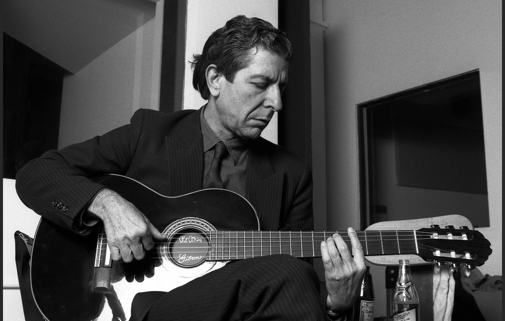 Leonard Cohen plays some of his songs in a small recording studio, lower Manhattan, New York, mid 1980s. (Photo by Oliver Morris/Getty Images)