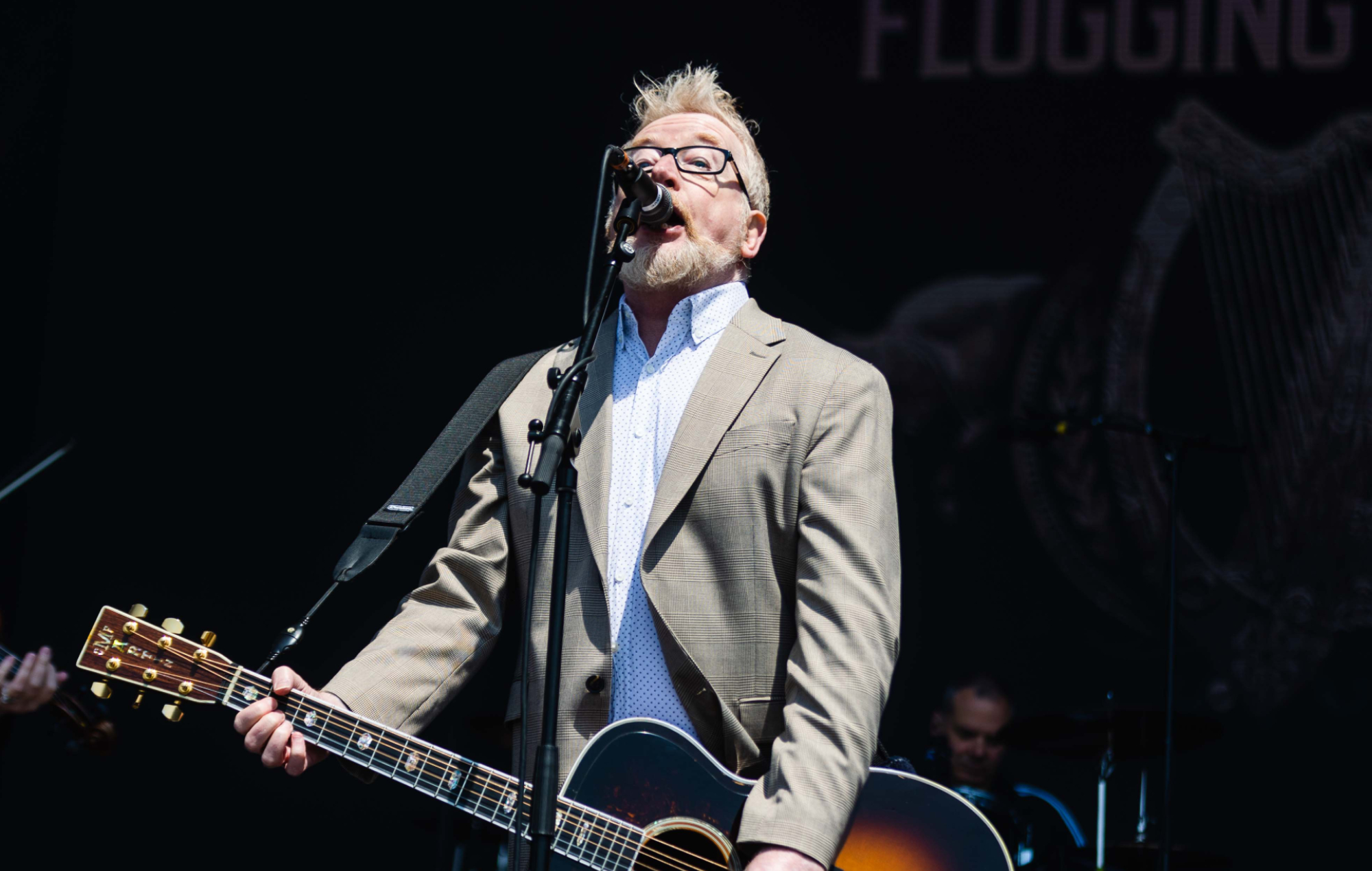 Dave King performing live on stage with Flogging Molly