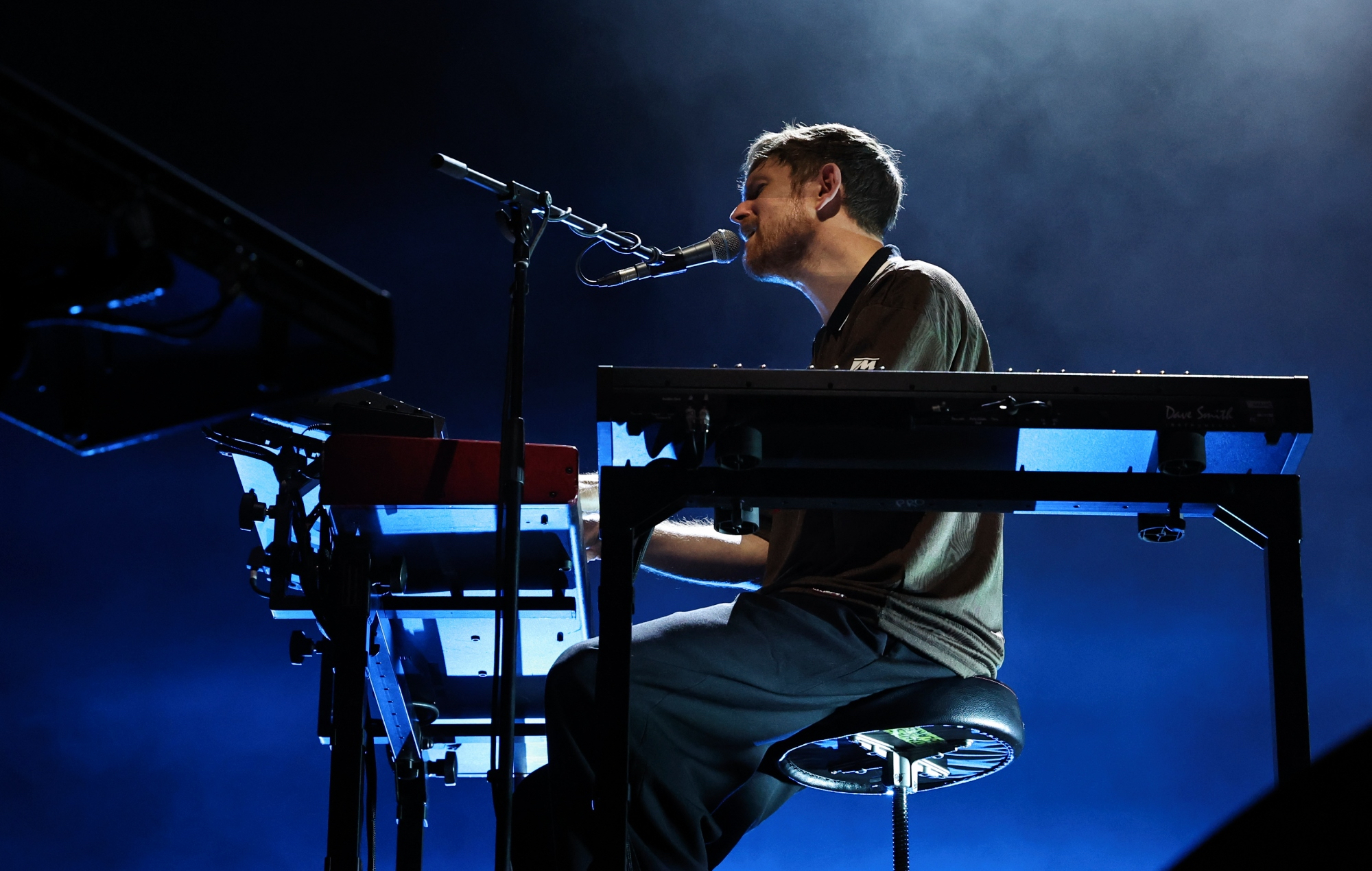 James Blake performing live on stage