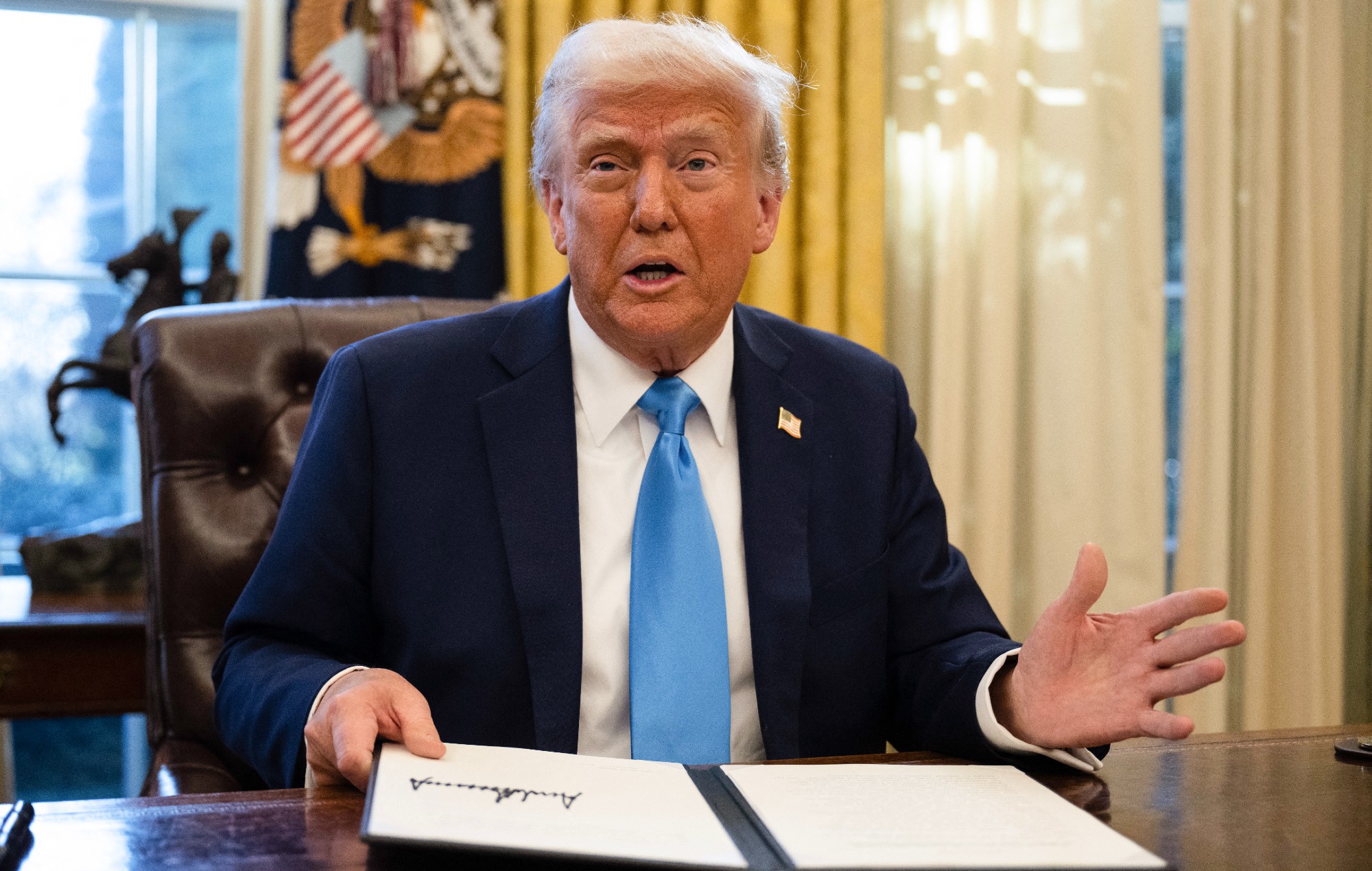 Donald Trump in The White House, Feb 2025. video game tariffs