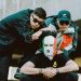 Kneecap share lively ‘The Recap’ video: “More Blacks, More Dogs, More Irish, Mo Chara”